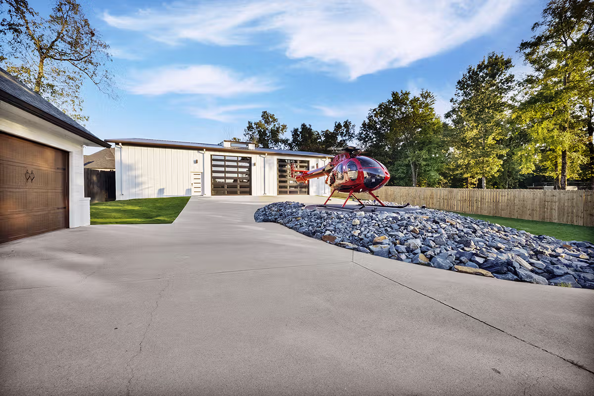 Luxury Redwater Home for Sale Front Driveway with Helicopter Pad