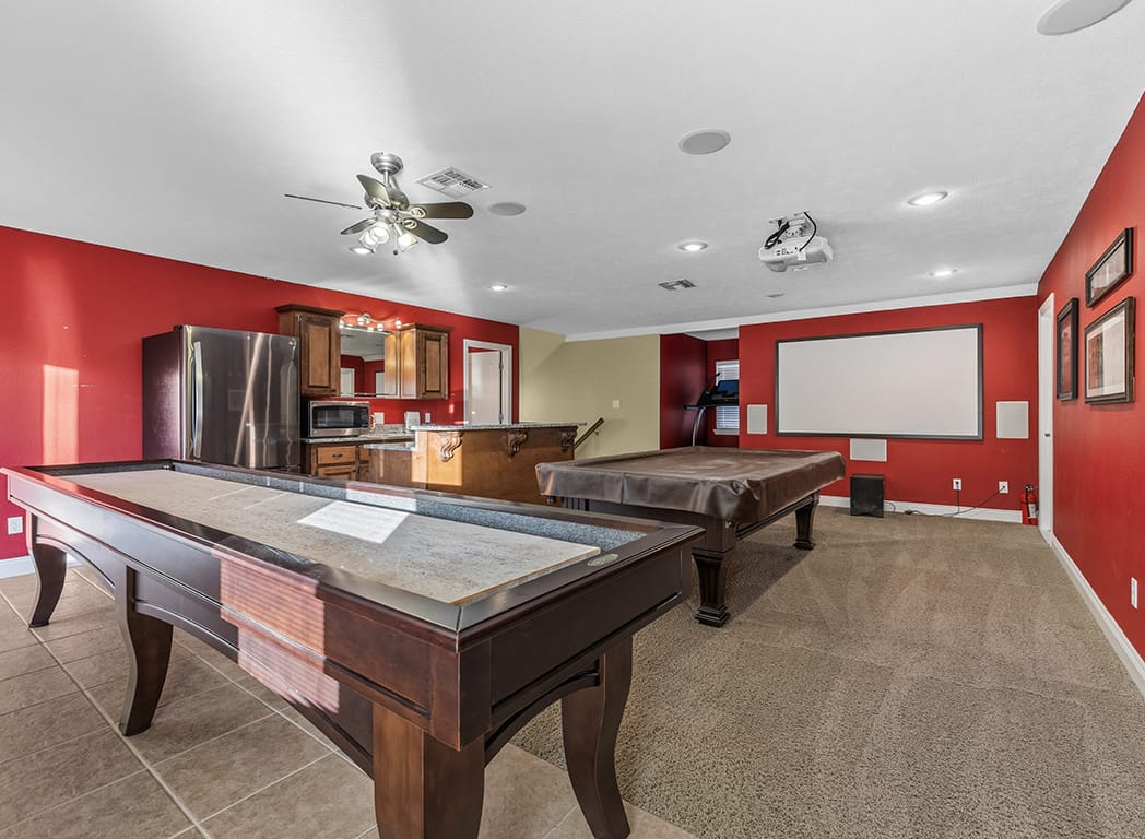 Game Room with Red Walls and Pool Table