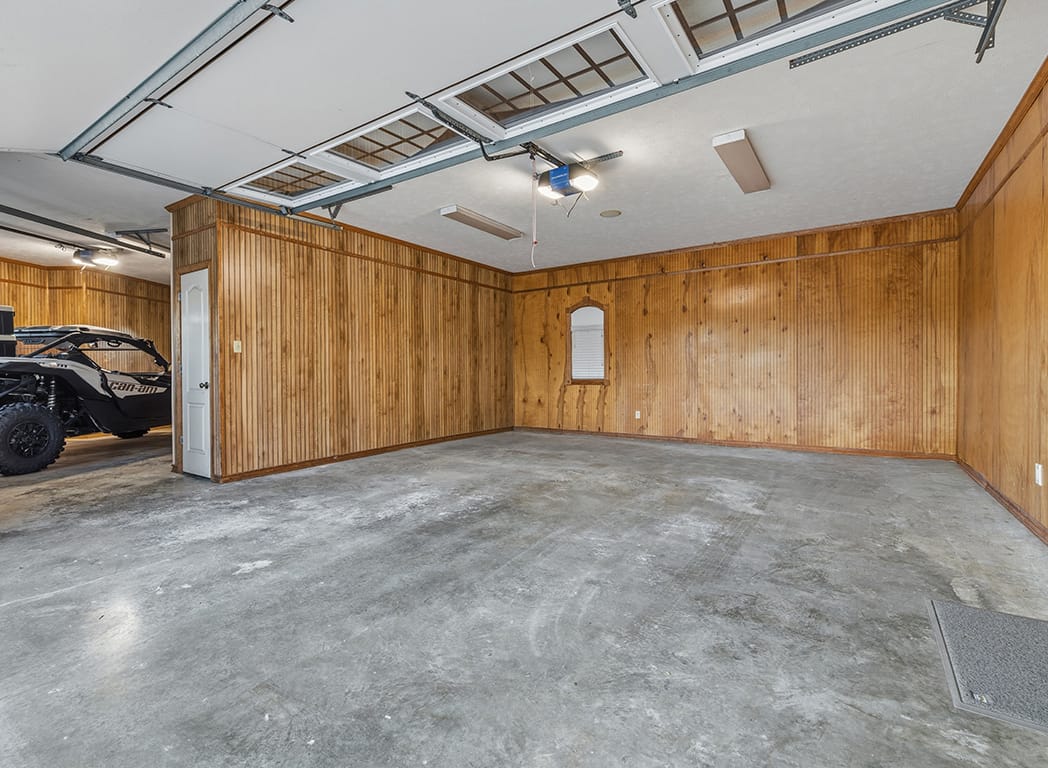 Garage Workshop with Wood Walls and Storage
