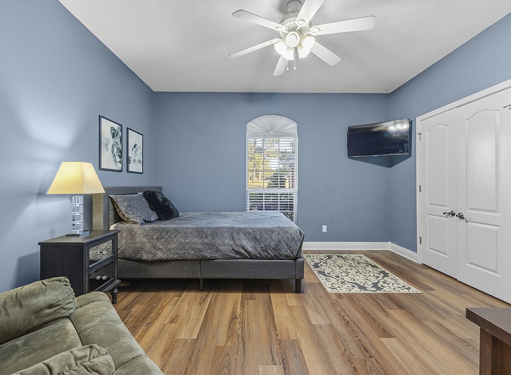 Guest Bedroom with Gray Walls and Ceiling Fan