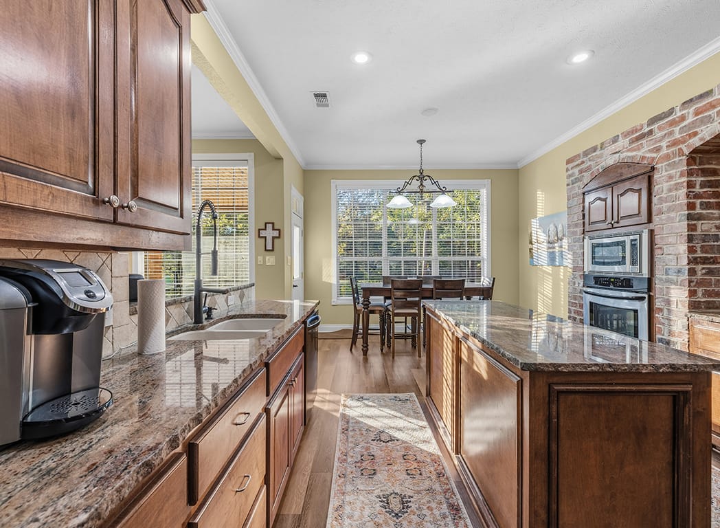 Kitchen with Granite Counters and Wood Cabinets