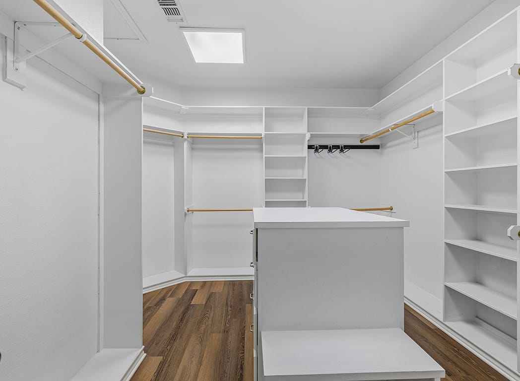 Primary Closet with lots of storage