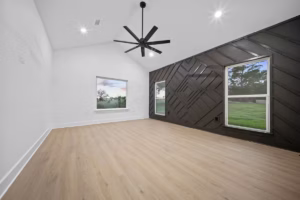 Red Lick Texas Primary Bedroom Accent Wall Modern Real Estate Photography