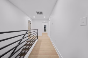 Red Lick Texas Upstairs Bedroom Modern Stair Railing Real Estate Photography