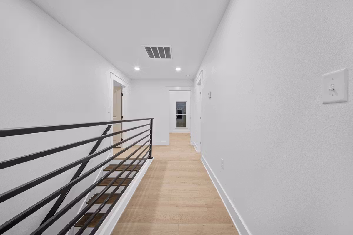 Red Lick Texas Upstairs Bedroom Modern Stair Railing Real Estate Photography