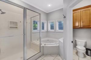 Real Estate Photography Company Stonegate Cir Texarkana Primary Bathroom Shower And Jetted Tub
